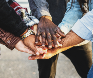 Peoples hands together